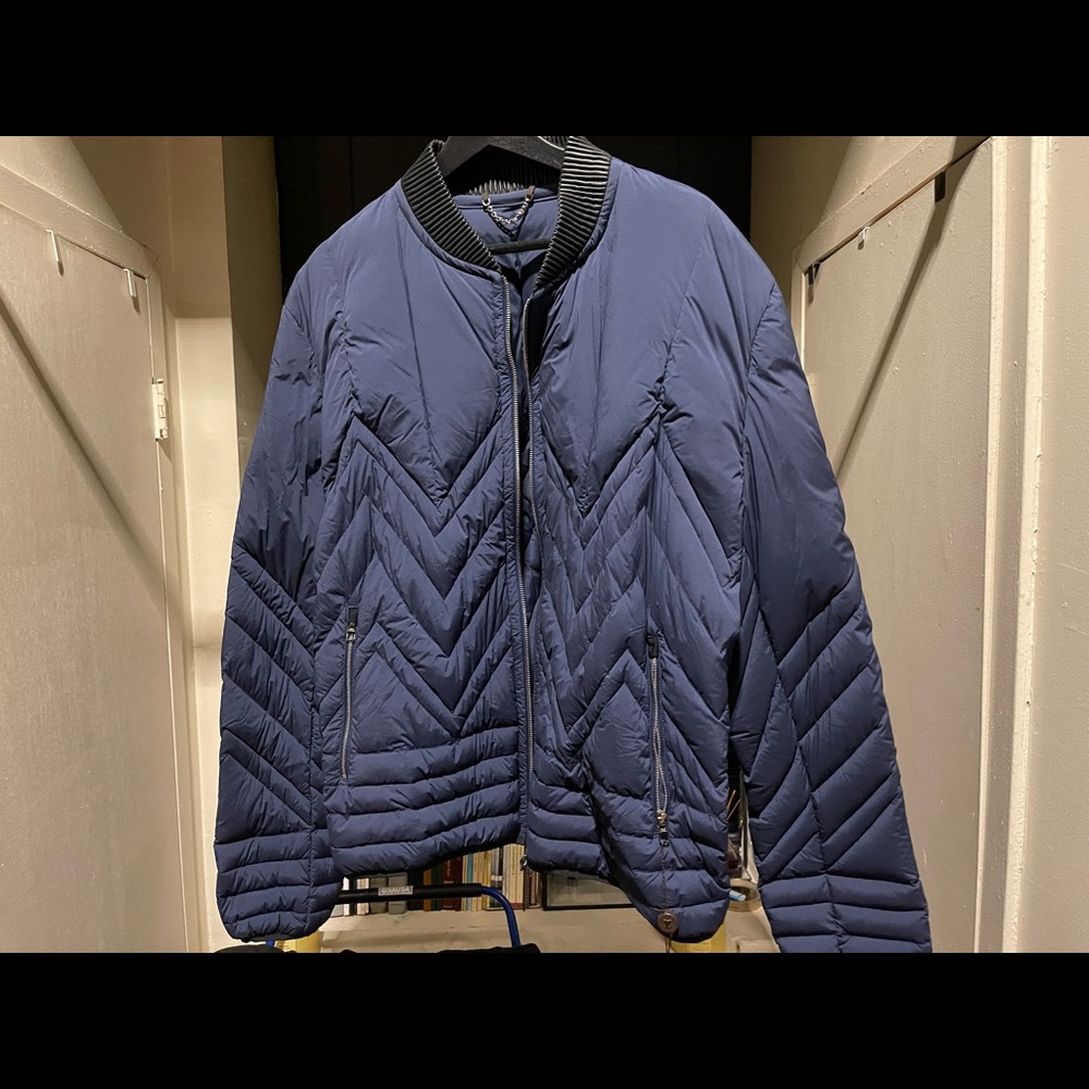 This listing is for a Louis Vuitton jacket in navy size 58 which is a mens XL